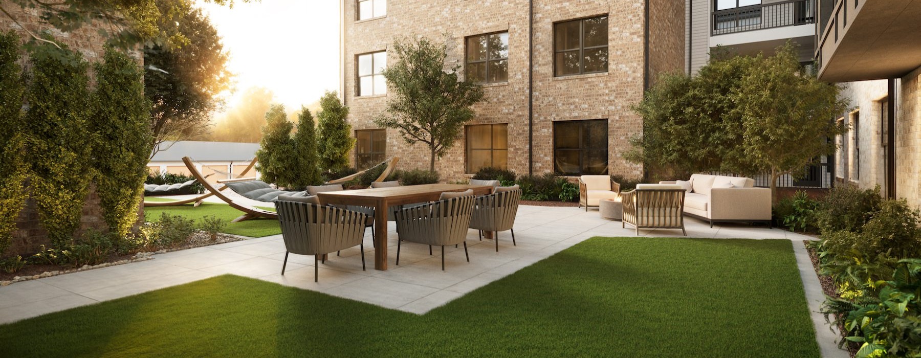 a courtyard with a table and chairs