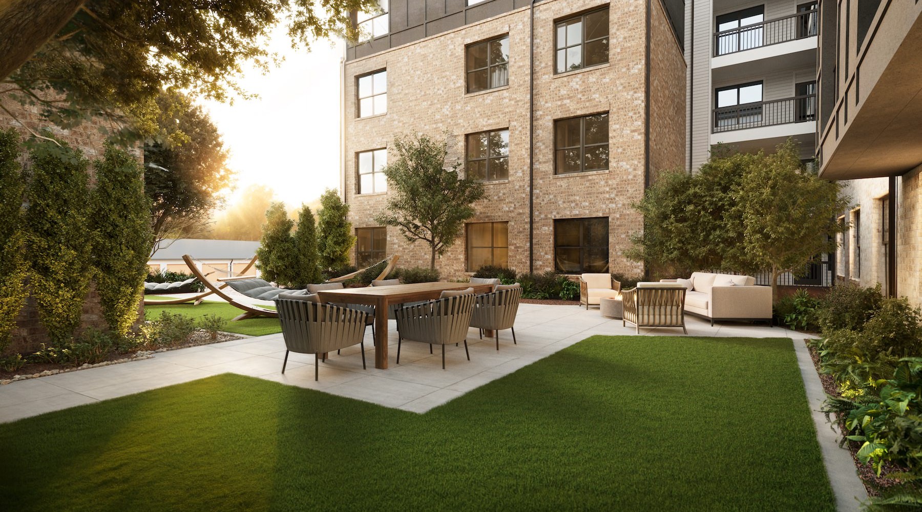 a courtyard with a table and chairs