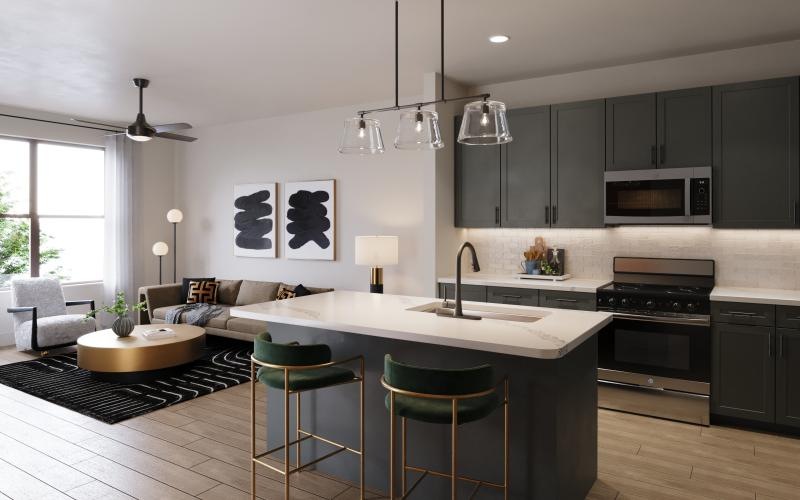 a kitchen with a couch and a table