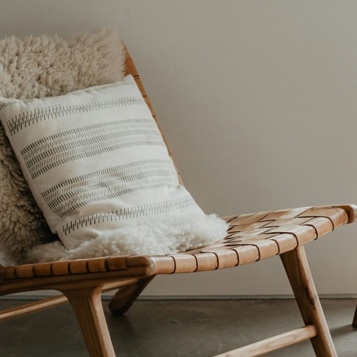 a chair with a pillow